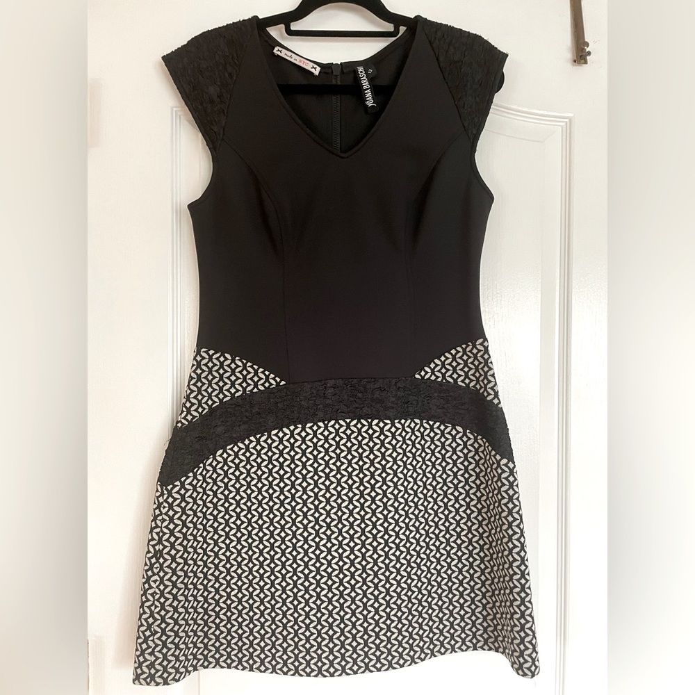 Comfortable casual dress with flattering detail on the hips.